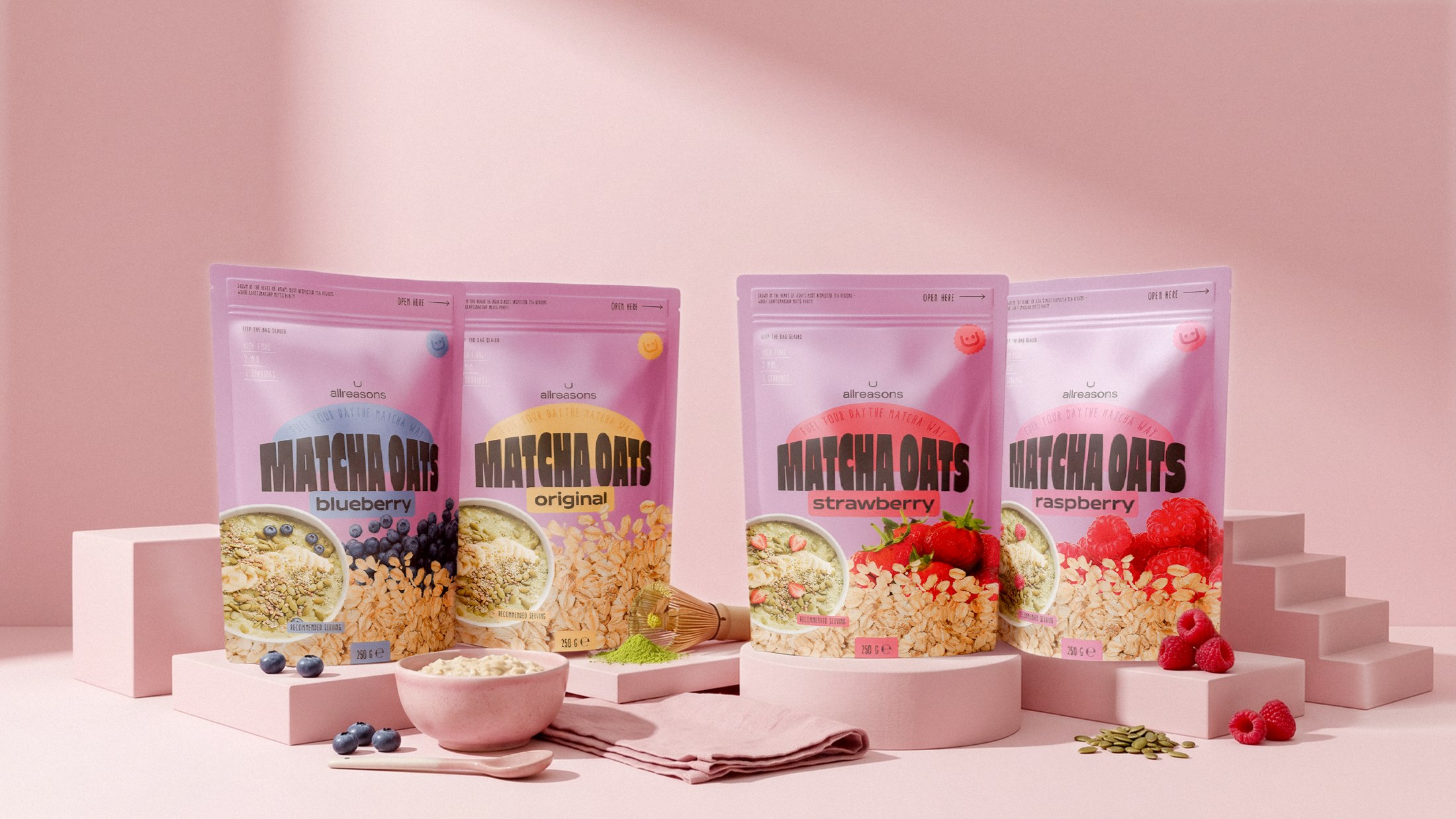 The matcha oats line — four pouches in a pink still life