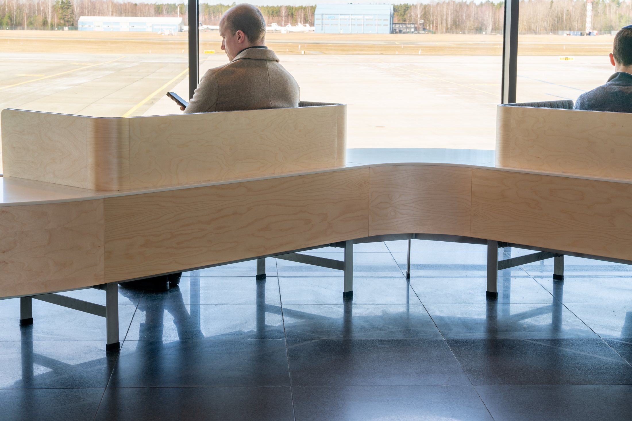 Gust — the seating run, material and joinery detail